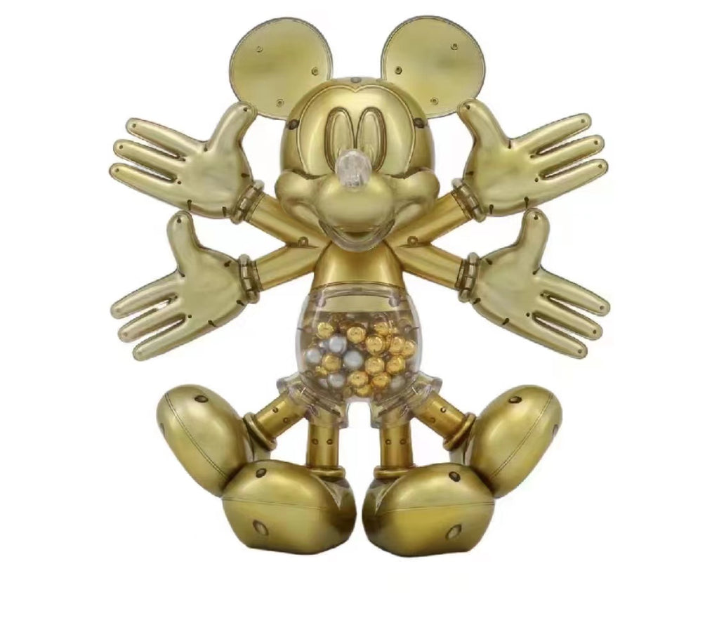 Front view of the Snow Angel Mickey Sculpture, featuring a golden finish with Mickey's iconic ears and multiple hands extended in a snow angel pattern