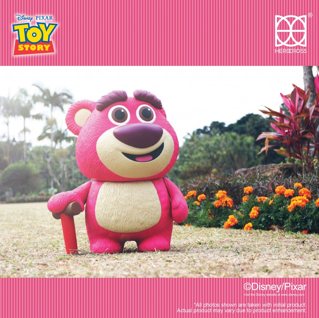 HEROCROSS Jumbo Lotso Huggin Bear figure standing in a garden, showcasing his charming strawberry scent.