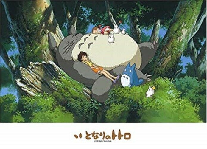 Illustration of Totoro, Satsuki, and Mei taking a nap on Totoro's belly in a sunlit forest, surrounded by smaller forest spirits.